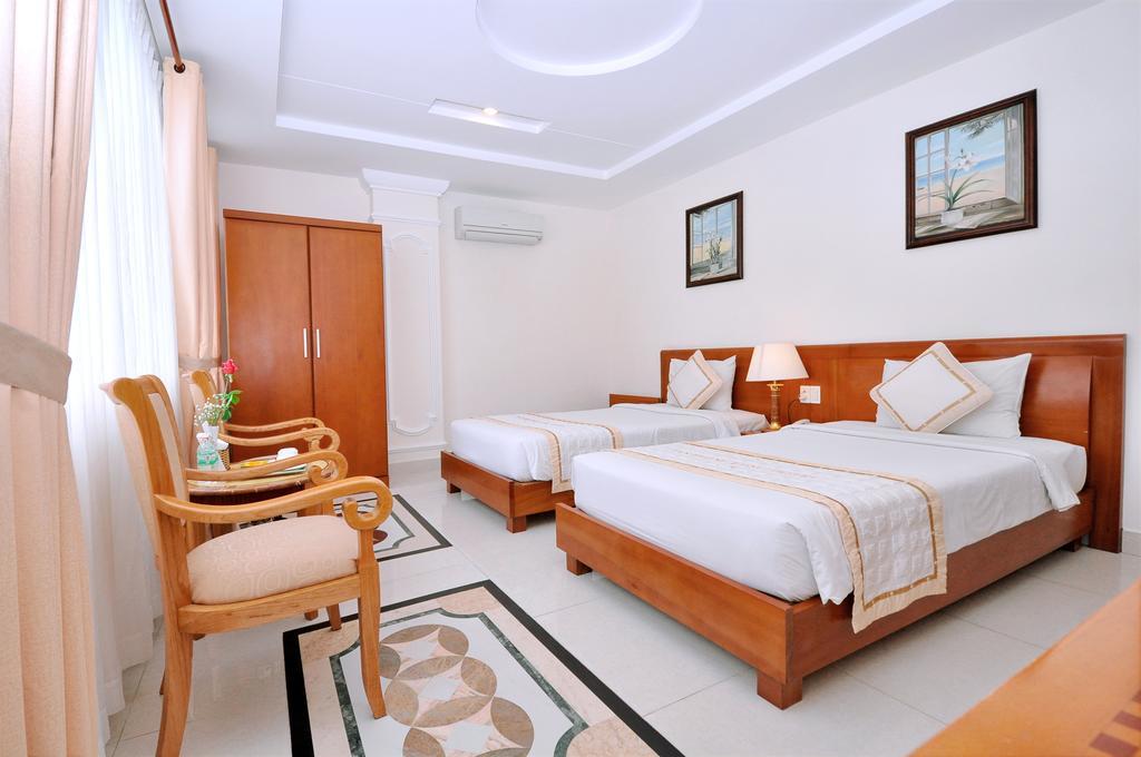 Tan Hoang Long Hotel Хошимин Екстериор снимка